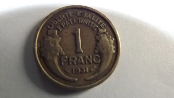 1 franc morlon 1931  métal bronze- aluminium poids 4 g  diamètre  23 mm  épaisseur 1.70